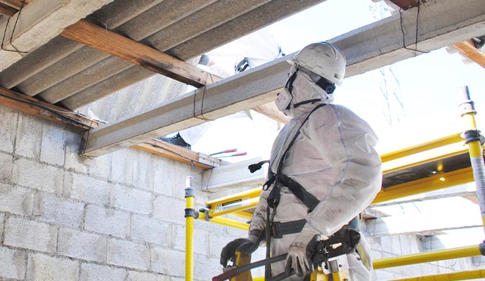man waring uniform asbestos removal service